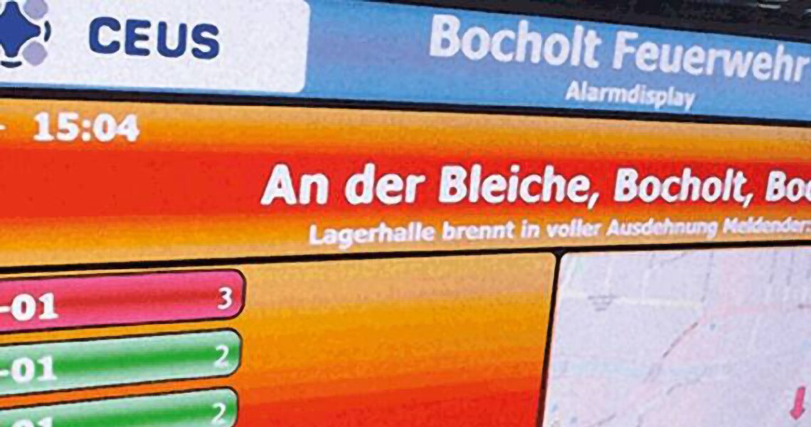 Monitor displaying the user interface of Alarm visualization and control center software for the Bocholt fire department