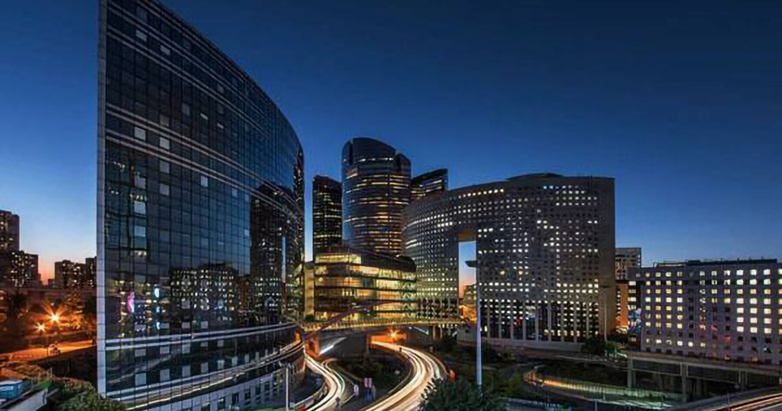 Night-time view of La Défense business district in Paris, France