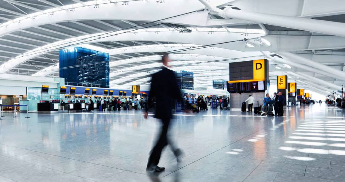 Motion-blur shot of people walking in an airport