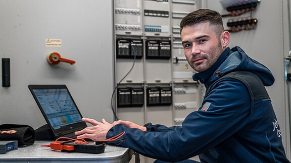 Technician working on a laptop