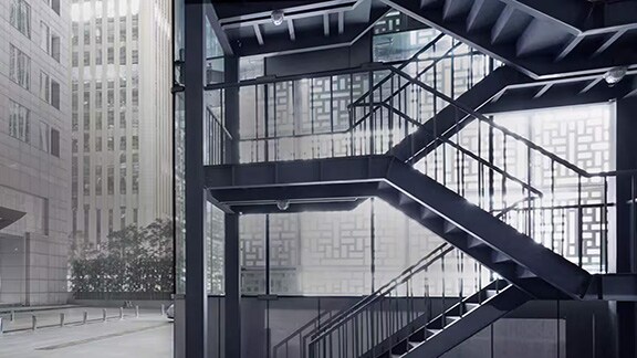 Exterior of a commercial building with a gray overlay