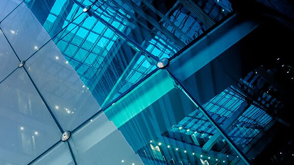 Low-angle view of a skyscraper with glass exteriors