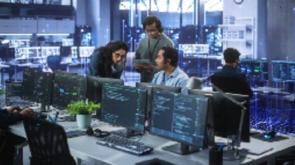 Group of employees having a meeting in office